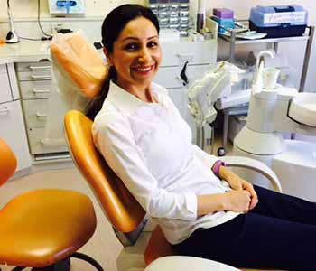 a patient site on a dentist chair