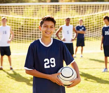 Player In High School Soccer Team