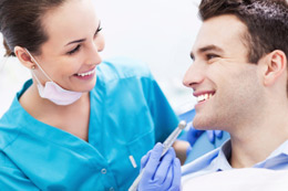 First Dental Exam Chicago - Dentist with a Patient