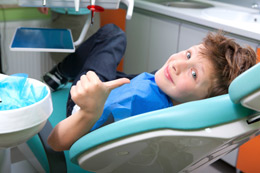 Kids Dentist Chicago IL - A kid in Dental