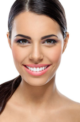 Cosmetic Dentist in Chicago - Smiling Young Woman