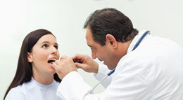 Chicago Gum Disease - A Dentist Checking a Patient
