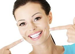 Chicago Cosmetic Dentures - Lady Showing Her Nice Teeth