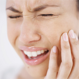 Emergency Dental Care Chicago- Woman with toothache