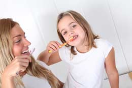 Flouride Treatments Chicago - A Girl Brushing her Teeth