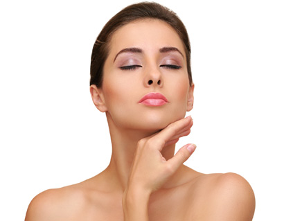 Beautiful woman touching her face