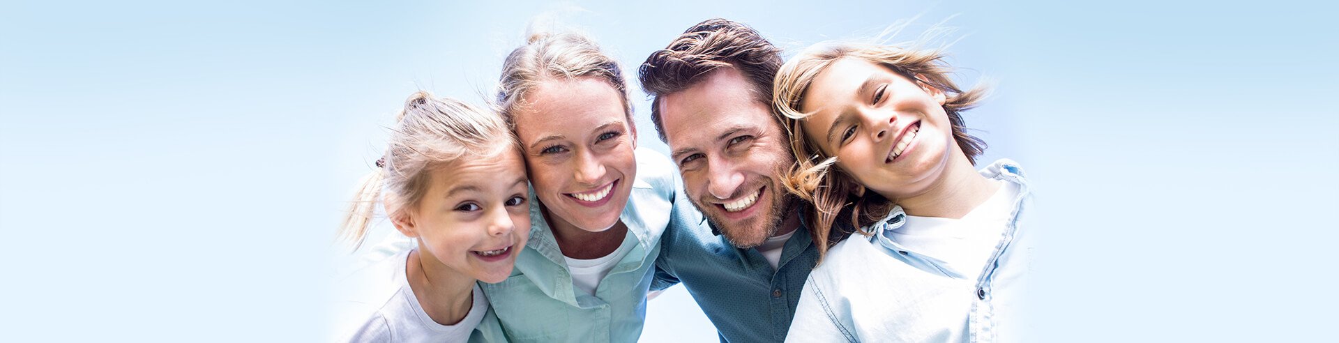 A smiling family with healthy teeth