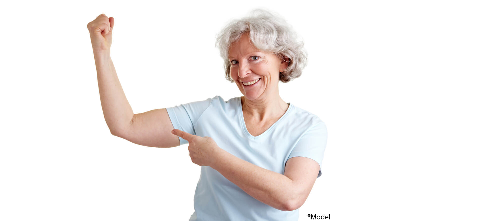 Elderly happy senior woman showing her upper arm