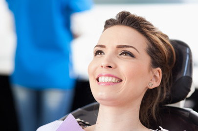 Dentist waiting to be checked up with the woman