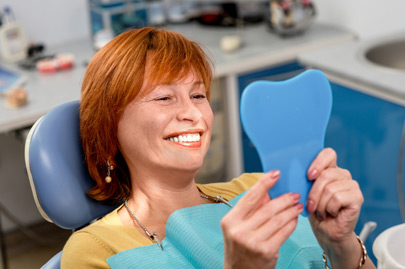 Senior woman in the dental office.