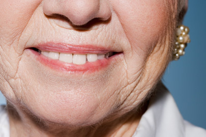 Senior woman wearing earrings