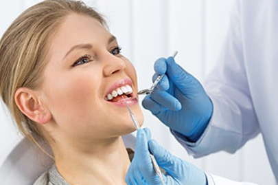 Smiling woman at dentist