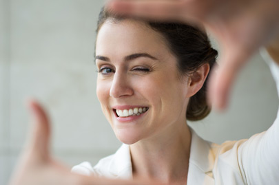 Smiling Woman Making Frame Gesture
