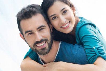 Young man piggyback her girlfriend