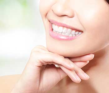 Daly City CA smiles beautifully with porcelain veneers