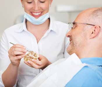 What is the process of obtaining full dentures with a dentist in Quincy, MA?