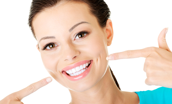 Woman showing her perfect teeth