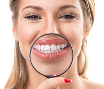 Women with a magnifying