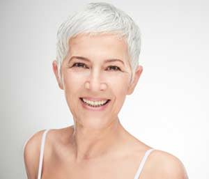 Adult woman after having Dental implant