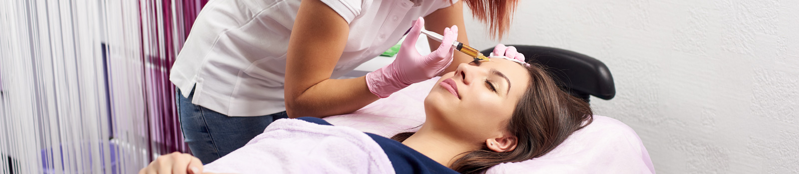 Filler injection for female forehead face.