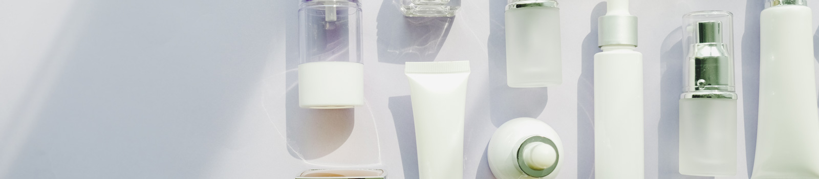 group of skincare cream serum oil