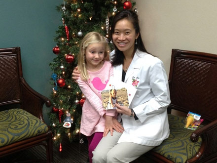 Dr. Christina T. Do is presenting gift