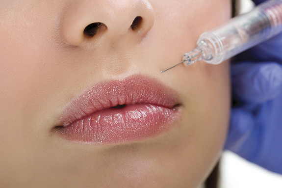 A woman under botox treatment