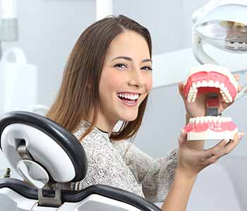 Dr. Theodore Siegel, gets patients without teeth into great-fitting dentures with advice to help them last a long time.