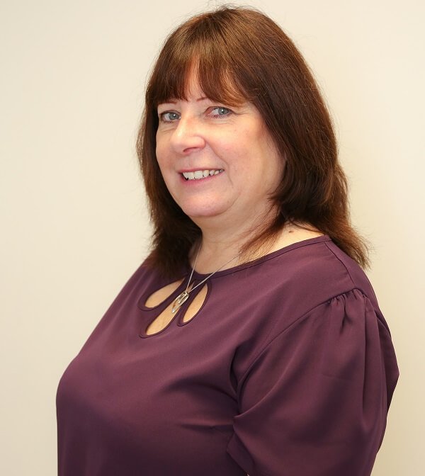 Receptionist, Denise Foley