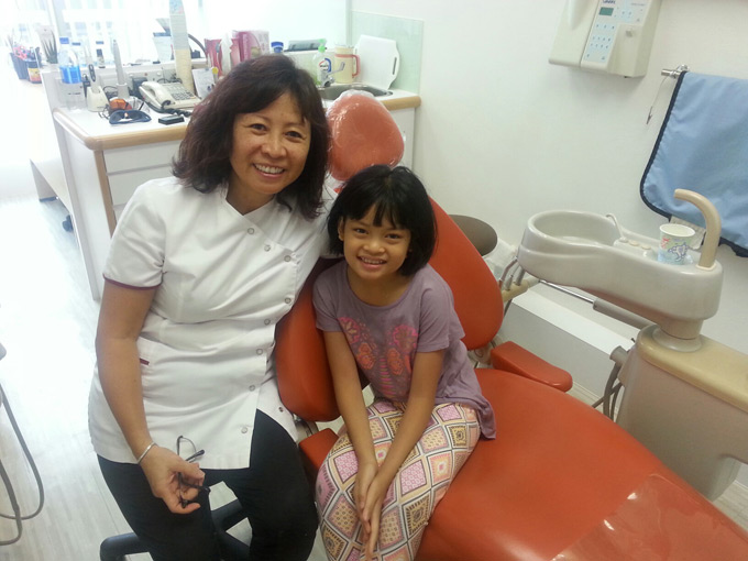 Dr.Tong with Young Patient